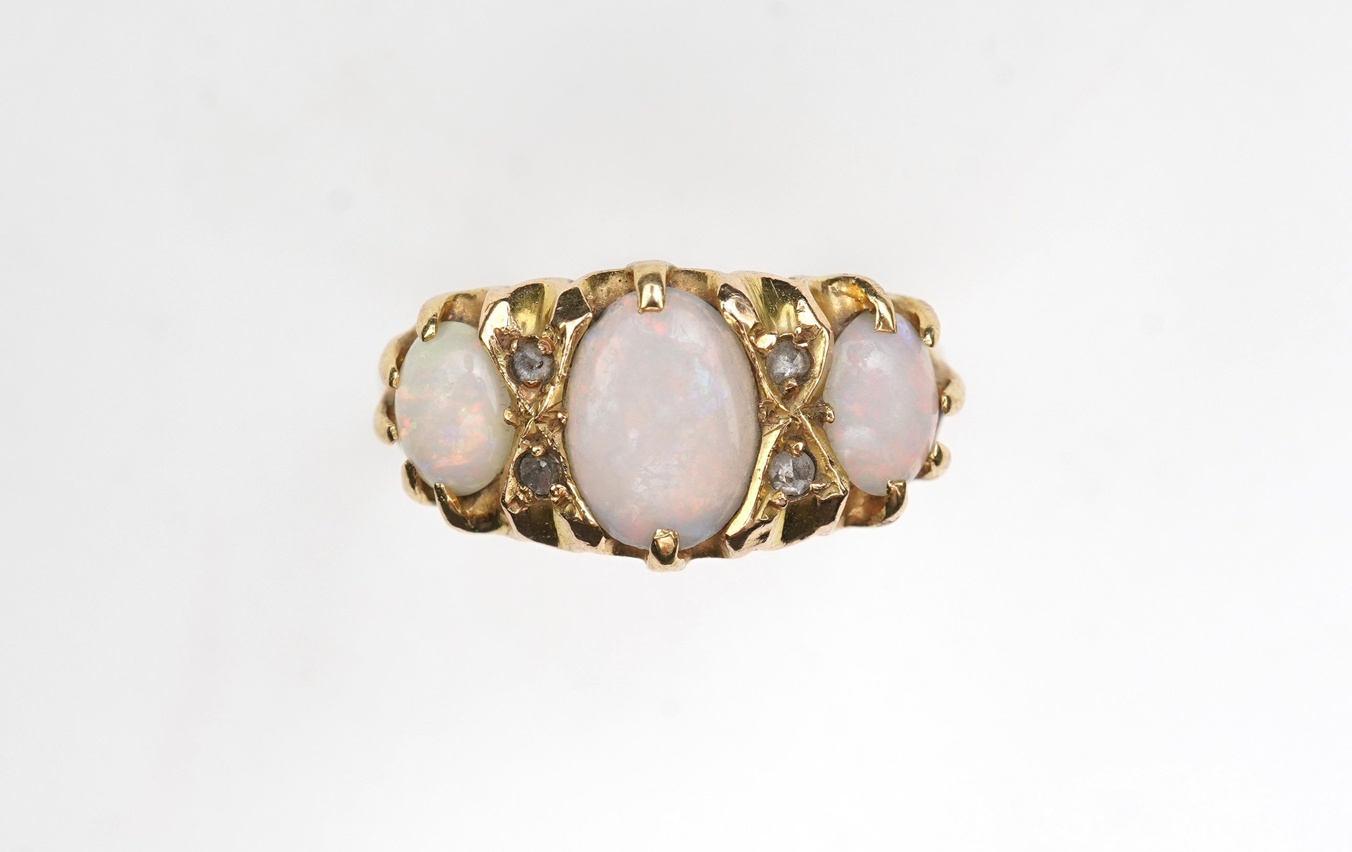 A Victorian 18ct gold and opal ring, circa 1898